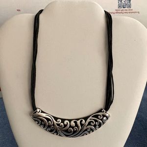 Corded Necklace with Silver Toned Pendant